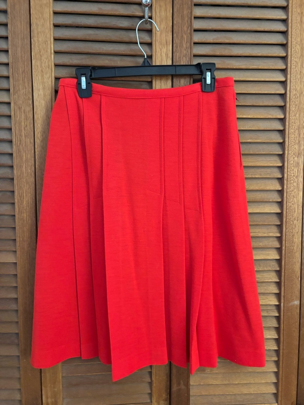 Vintage tomato red wool skirt. A line. Accordion pleats in front. Medium.